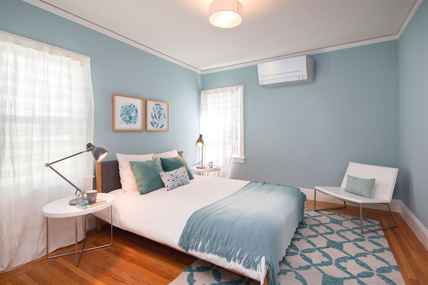 Bedroom with high wall heat pump